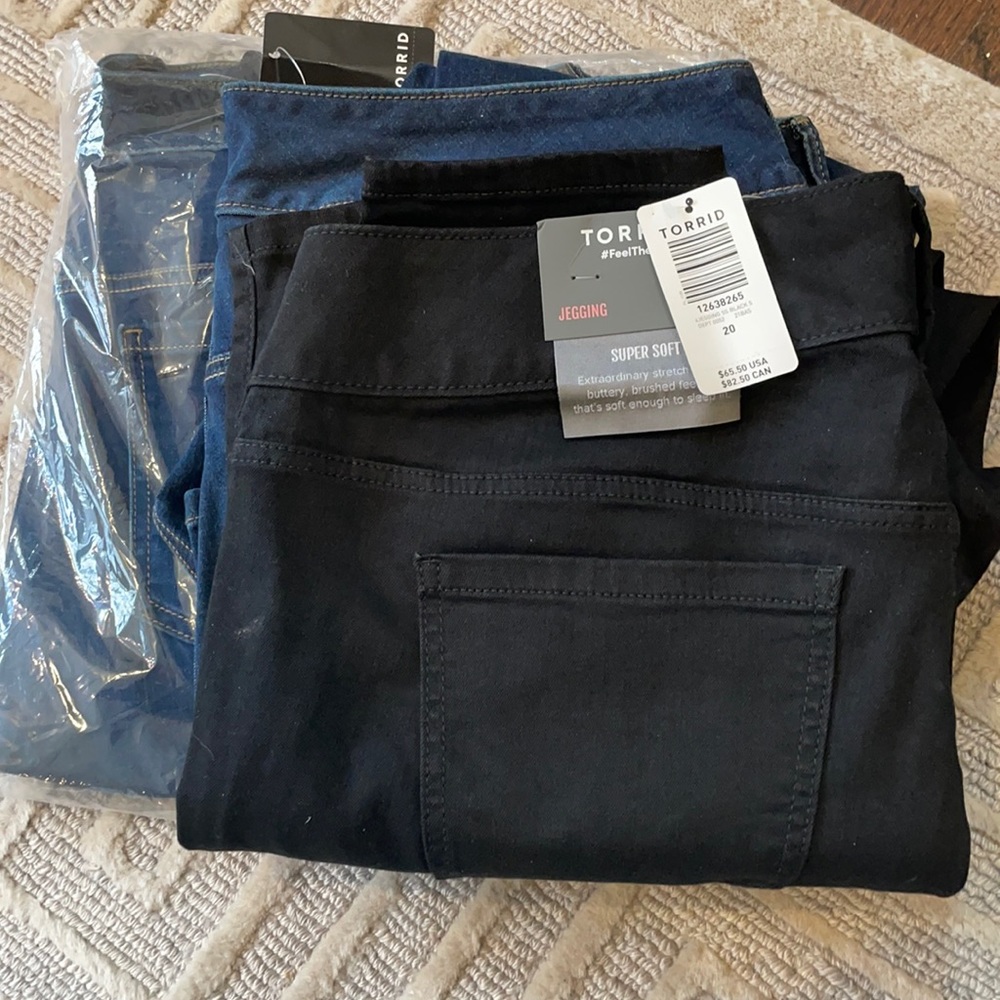 3 pairs of Torrid Jeans all size 20 short. These have a lot of stretch.
